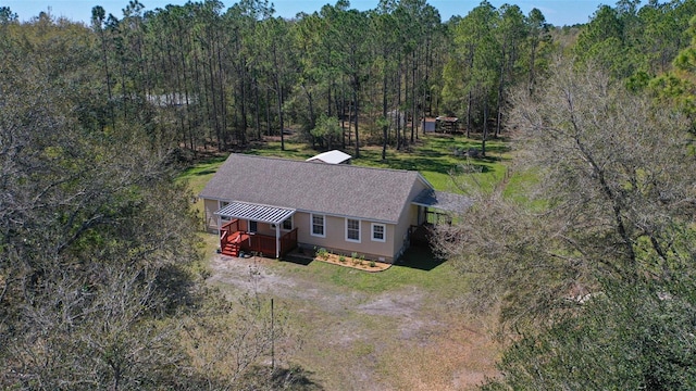 bird's eye view with a forest view