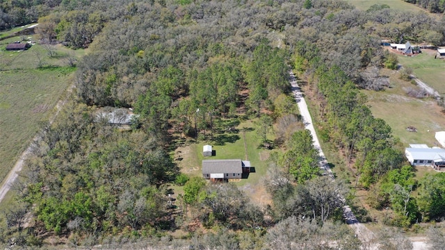 bird's eye view featuring a forest view