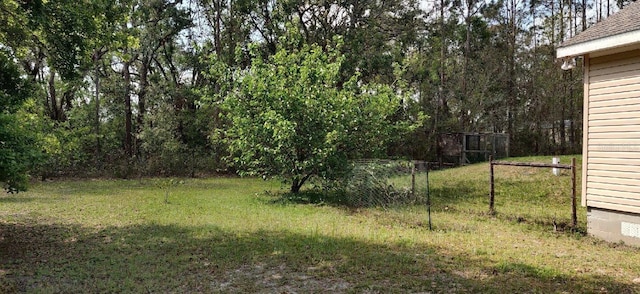 view of yard with fence