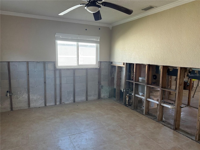 unfurnished room with ornamental molding, tile patterned flooring, visible vents, and a ceiling fan