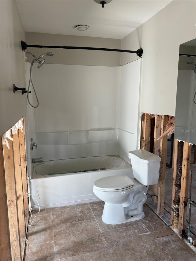 bathroom with shower / tub combination and toilet