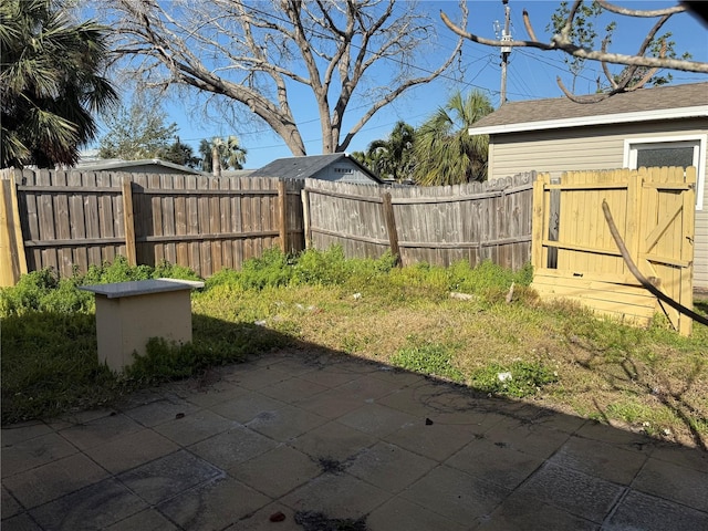 view of yard featuring a patio area and fence