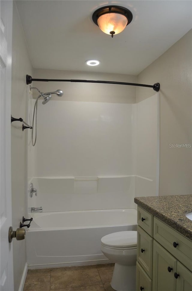 full bathroom with  shower combination, tile patterned flooring, vanity, and toilet