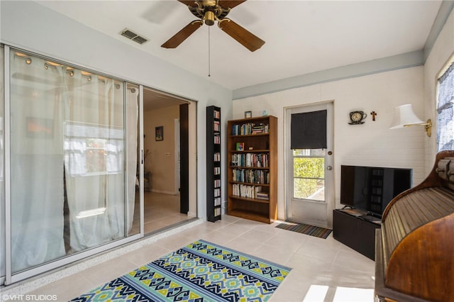 interior space with light tile patterned floors and visible vents