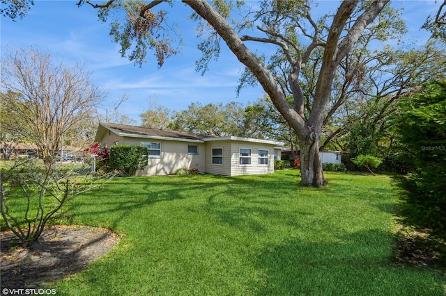 view of yard with fence