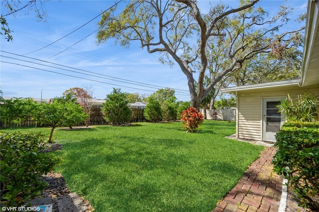 view of yard featuring fence