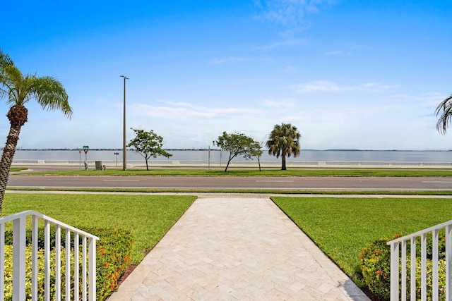 view of yard with a water view