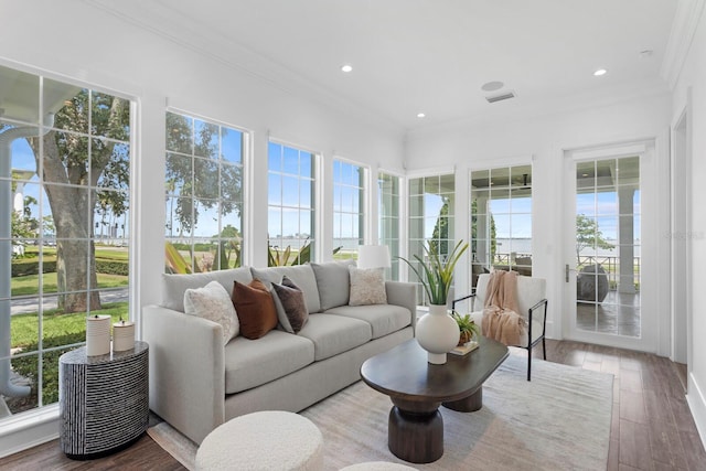 sunroom / solarium featuring visible vents