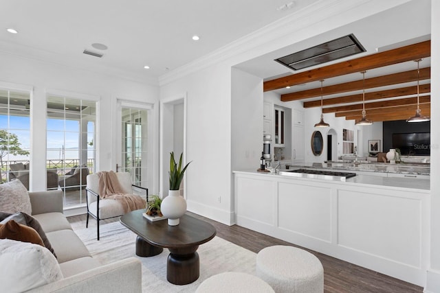 living area with baseboards, dark wood finished floors, ornamental molding, beamed ceiling, and recessed lighting