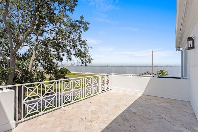 view of patio featuring a water view