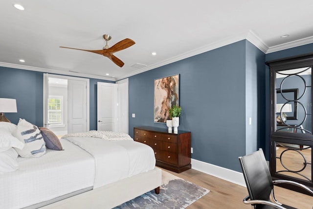 bedroom featuring recessed lighting, wood finished floors, a ceiling fan, baseboards, and ornamental molding