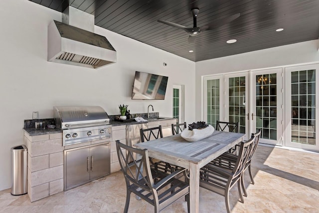 view of patio featuring an outdoor kitchen, a ceiling fan, grilling area, french doors, and outdoor dining space