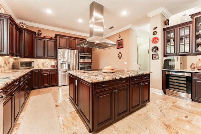 kitchen with a center island, backsplash, appliances with stainless steel finishes, island range hood, and beverage cooler