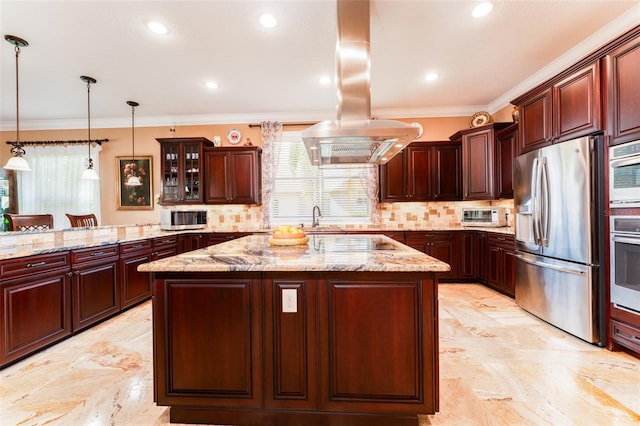 kitchen featuring island range hood, appliances with stainless steel finishes, a center island, tasteful backsplash, and crown molding