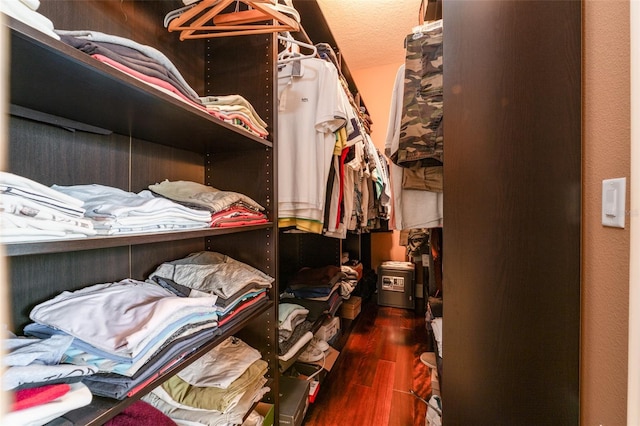 spacious closet with wood finished floors