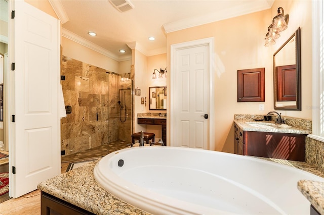 full bathroom featuring a tub to relax in, vanity, visible vents, a tile shower, and crown molding