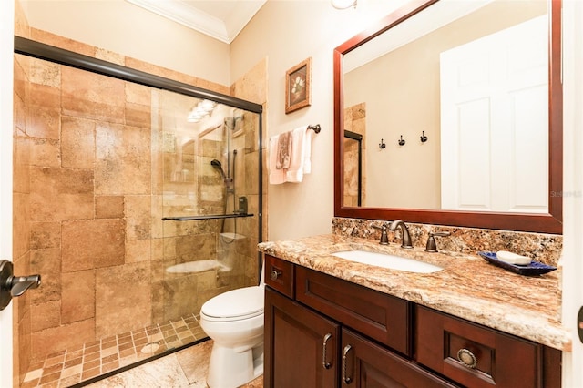 bathroom featuring toilet, ornamental molding, tile patterned floors, vanity, and a shower stall