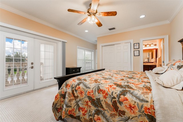 carpeted bedroom featuring ornamental molding, access to outside, french doors, and visible vents