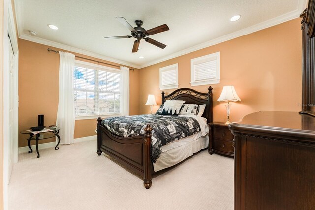 bedroom with crown molding, recessed lighting, light carpet, ceiling fan, and baseboards