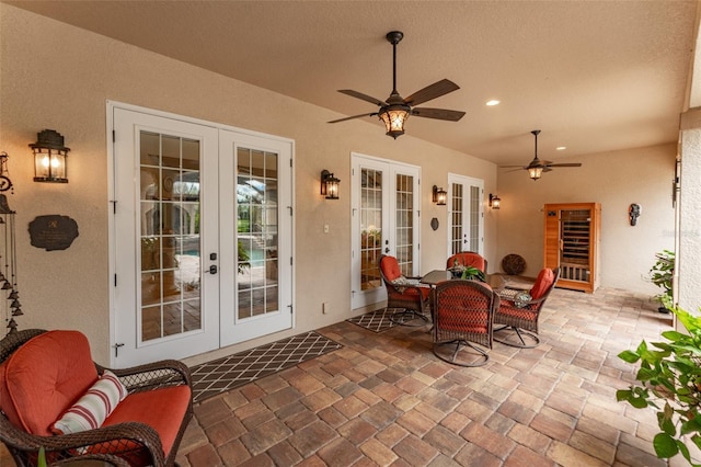 view of patio / terrace featuring french doors and a ceiling fan