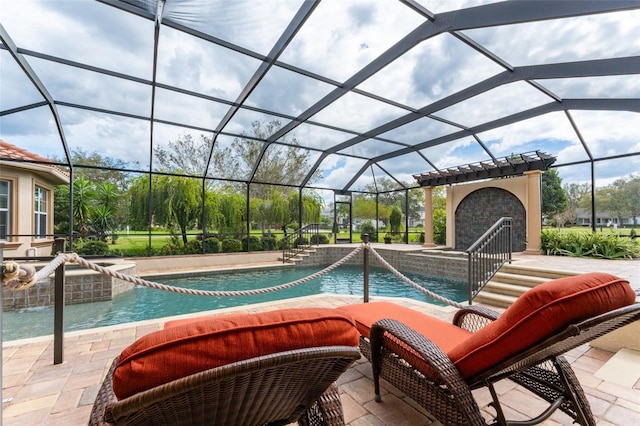 outdoor pool with a patio and an outdoor brick fireplace