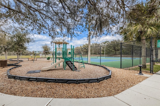 community jungle gym with fence