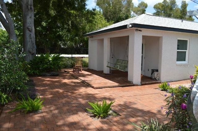 view of patio with fence