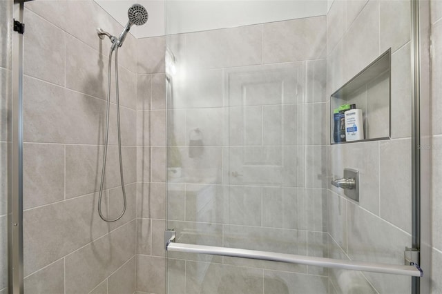 full bath featuring a stall shower