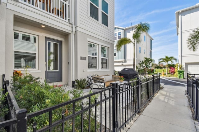 balcony with an outdoor living space and a grill