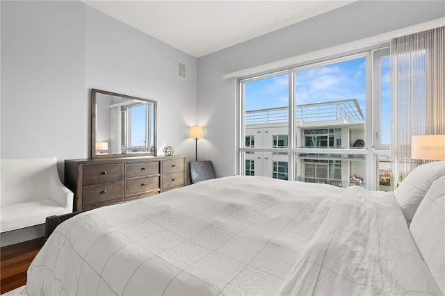 bedroom with wood finished floors