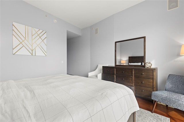 bedroom featuring wood finished floors