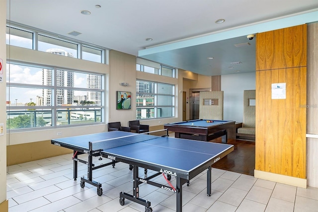 recreation room featuring a healthy amount of sunlight, light tile patterned floors, billiards, and recessed lighting