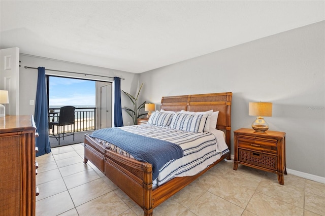 bedroom with light tile patterned floors, access to outside, and baseboards