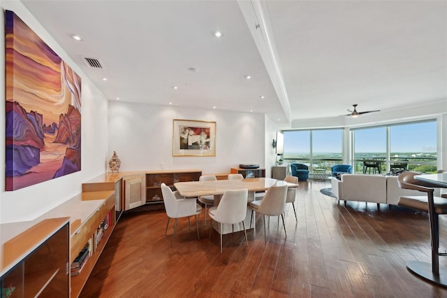 dining area with visible vents, a ceiling fan, hardwood / wood-style floors, and recessed lighting