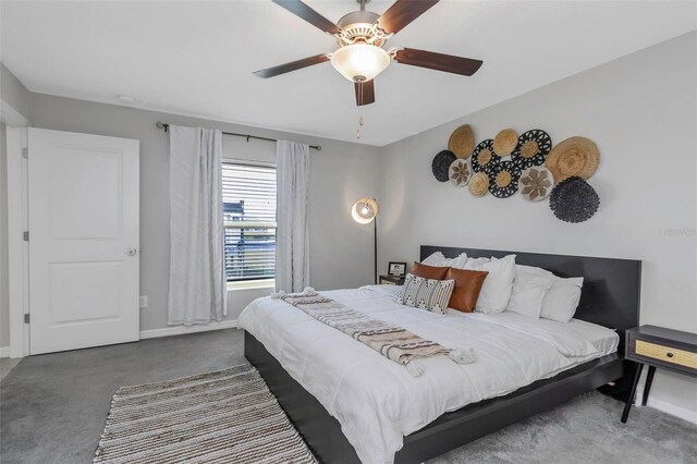 bedroom featuring ceiling fan, carpet flooring, and baseboards