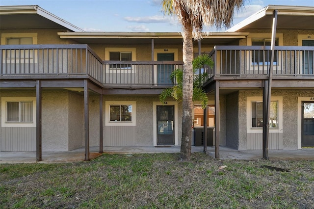 exterior space with stucco siding