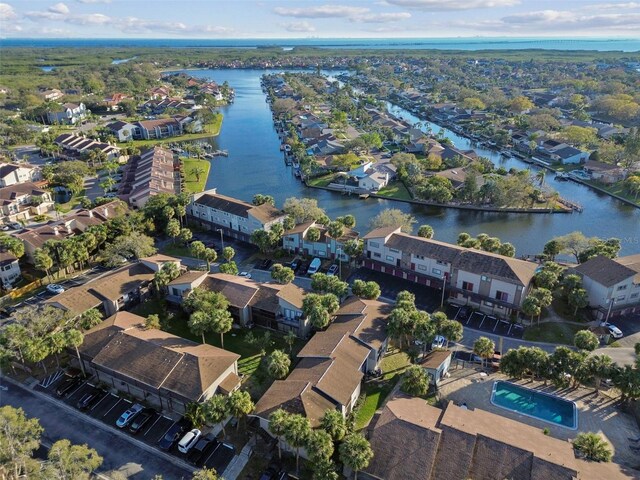 aerial view featuring a water view and a residential view