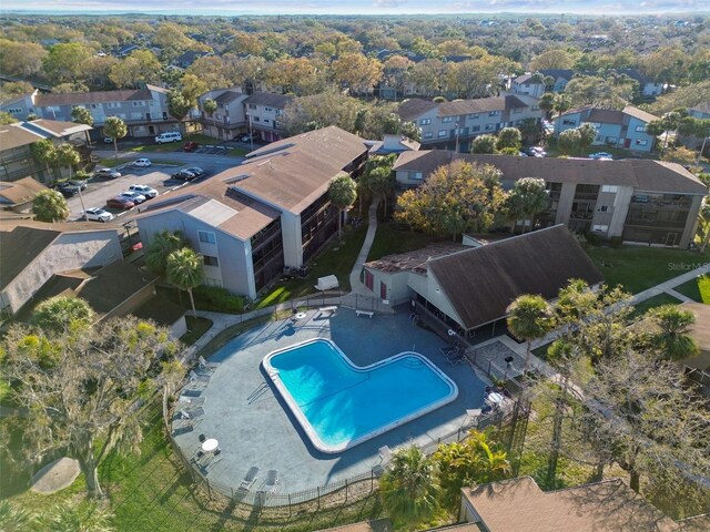birds eye view of property with a residential view