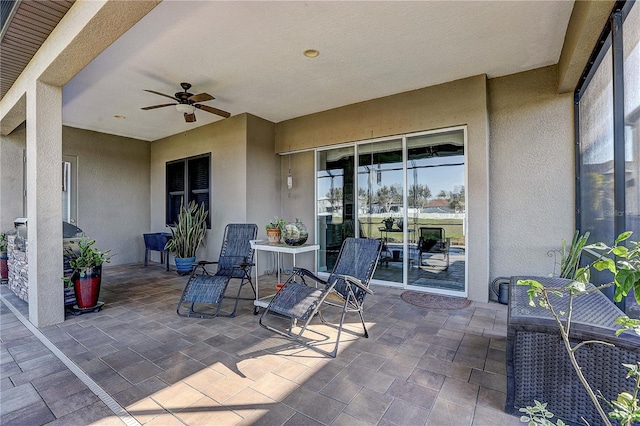 view of patio / terrace with a ceiling fan