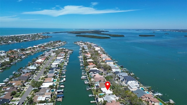 drone / aerial view featuring a water view and a residential view