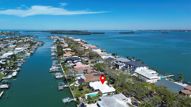 bird's eye view featuring a residential view and a water view