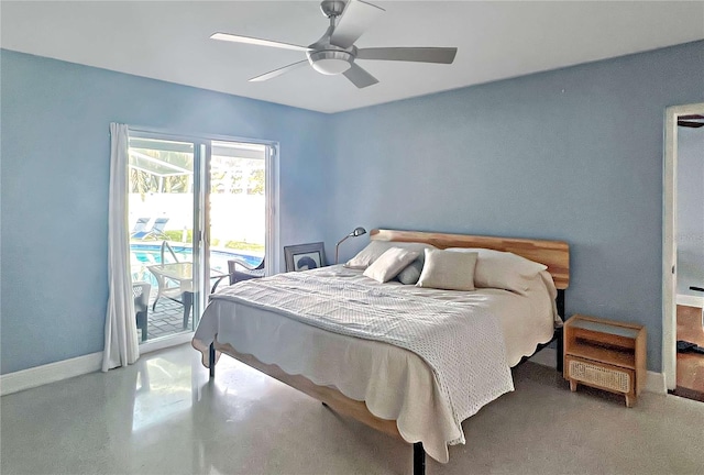 bedroom featuring access to exterior, ceiling fan, finished concrete floors, and baseboards