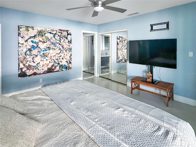 bedroom featuring baseboards, a closet, visible vents, and a ceiling fan