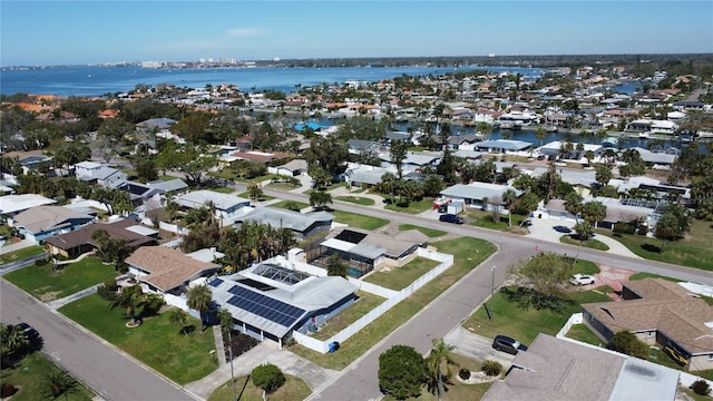 aerial view with a water view and a residential view