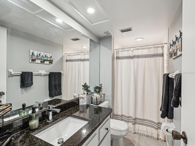 full bathroom with toilet, visible vents, and vanity