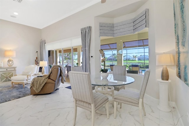 dining space with marble finish floor, recessed lighting, visible vents, and baseboards