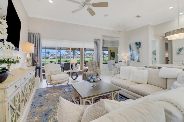 living room featuring visible vents, a ceiling fan, and recessed lighting