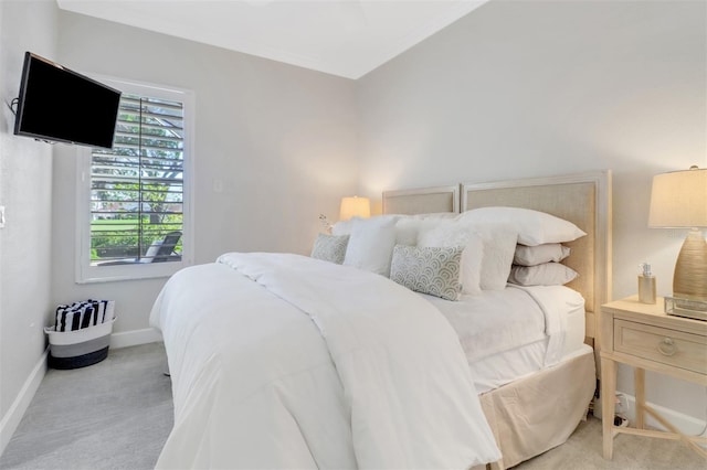 carpeted bedroom with baseboards