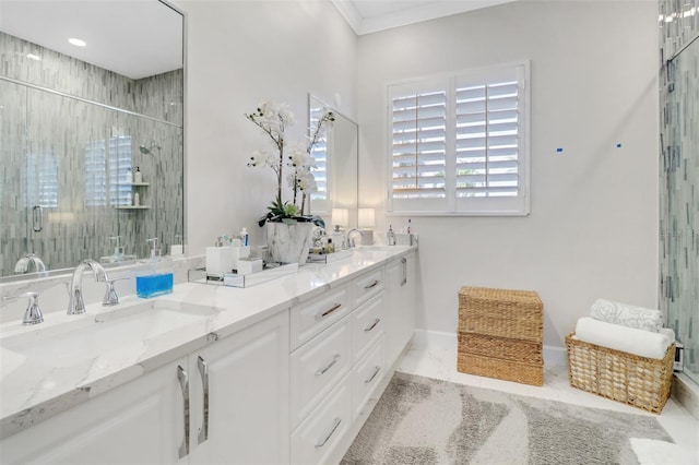 bathroom featuring ornamental molding, a stall shower, plenty of natural light, and double vanity