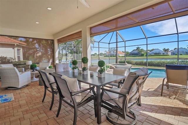 view of patio / terrace featuring a lanai and an outdoor pool